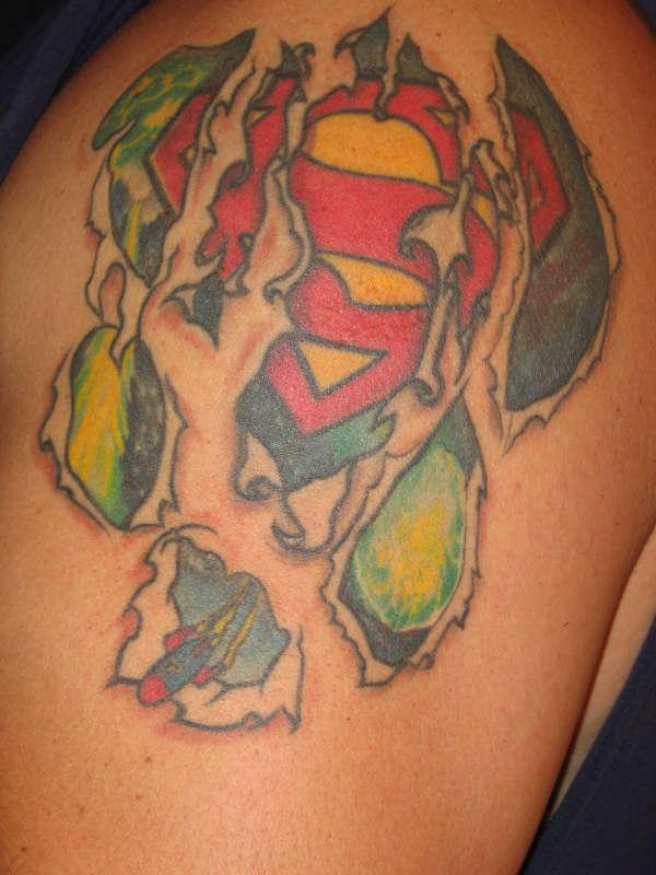 Ripped off Superman logo tattoo