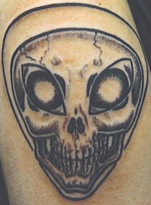 Alien Skull Face Tattoo Design