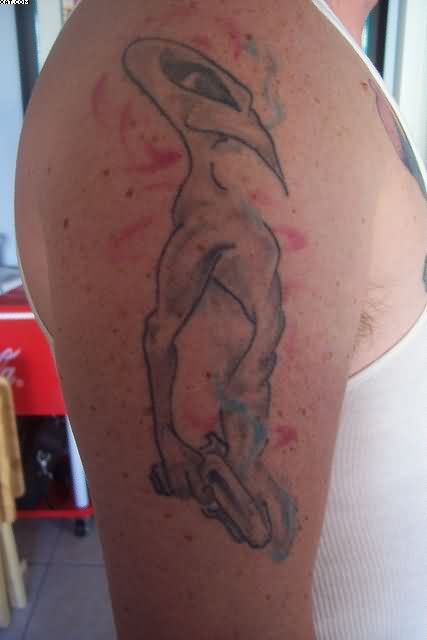 Grey Ink Big Nose Alien Tattoo