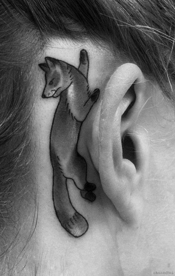 Fox tattoo behind the ear