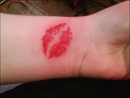 Lipstick Kiss Tattoo on Hand