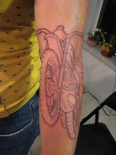 Outlining Biker Tattoo